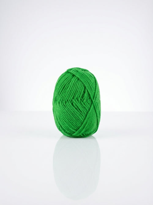Ball of apple green cotton yarn, showing its soft texture and vibrant color. Ideal for knitting and crochet.