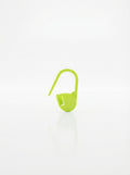 Apple green plastic crochet latch clip hook, close-up studio shot showing texture and color.