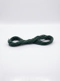 Dark anthracite gray cotton embroidery floss skein, showcasing the thread's texture and rich, deep color.