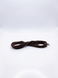 Studio shot of dark coffee brown cotton embroidery floss skein, showcasing its texture and rich color.