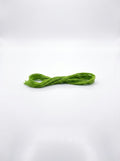 Chartreuse embroidery floss skein, tightly twisted cotton thread for crafting and sewing projects.