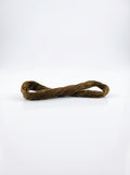 Close-up of a dark golden olive embroidery floss skein showing the cotton texture and gentle sheen.