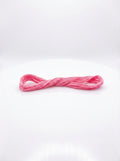 Single skein of geranium pink cotton embroidery floss, neatly wound and ready for crafting projects.
